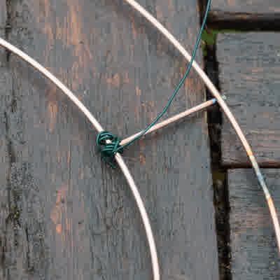 Florist wire secured to wreath ring